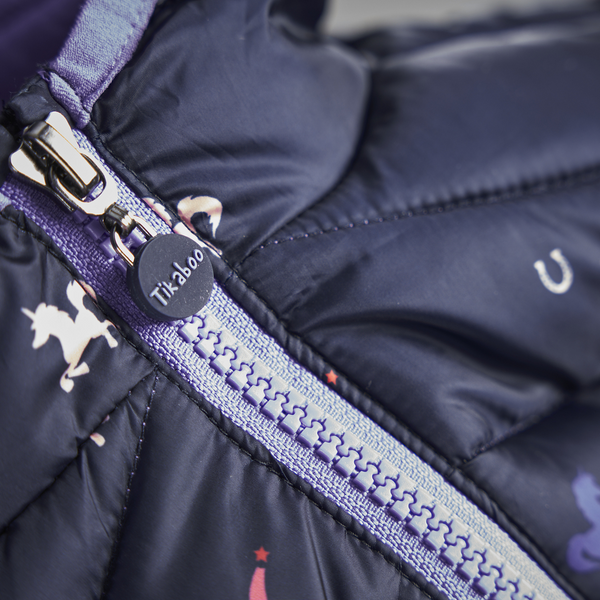 Close up of zipper on Tikaboo Padded Coat in Unicorn