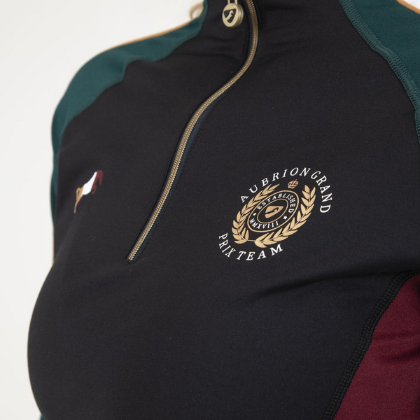Close up of logo on Aubrion Team Winter Baselayer in Green