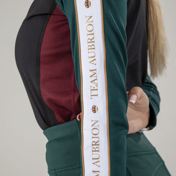 Close up of sleeve on Aubrion Team Winter Baselayer in Green