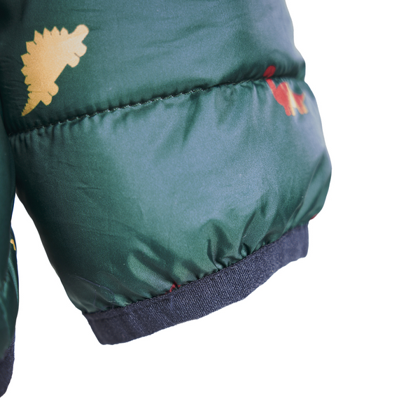 Close up of cuff of Tikaboo Padded Coat in Dinosaur