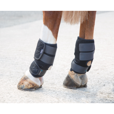 ARMA Hot/Cold Joint Relief Boots being used on fetlocks