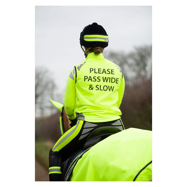 Rear view of rider wearing Reflector Gilet by Hy Equestrian in Yellow