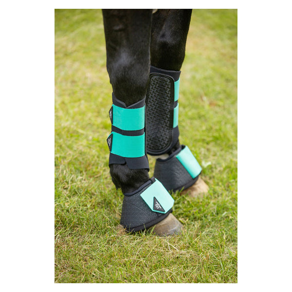 Hy Sport Active Brushing Boots in spearmint green with matching overreach boots