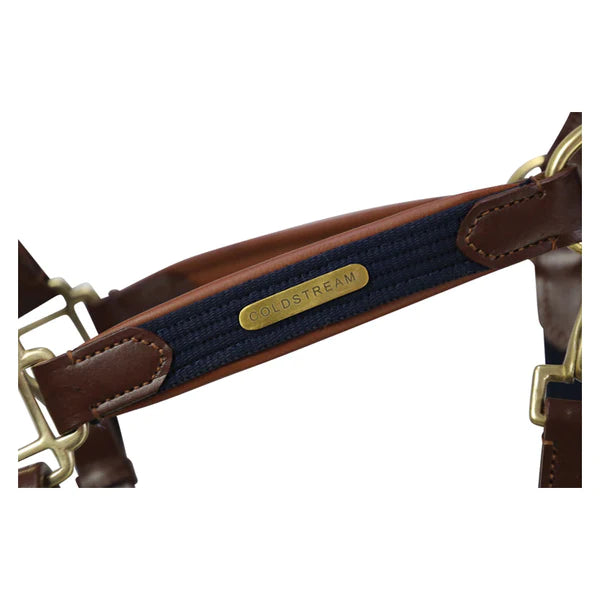 Close up of coldstream brass plate, tan/navy