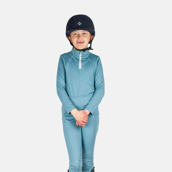 Child wearing Cameo Core Collection Baselayer Junior in Cloud blue