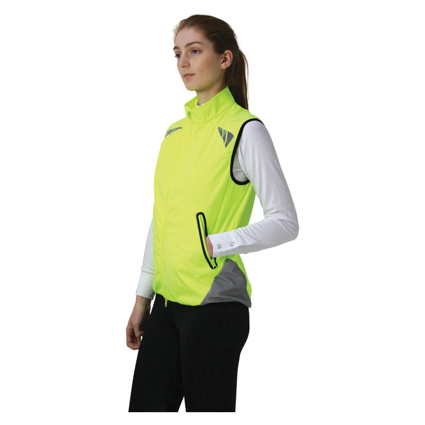 Lady wearing Reflector Gilet by Hy Equestrian 