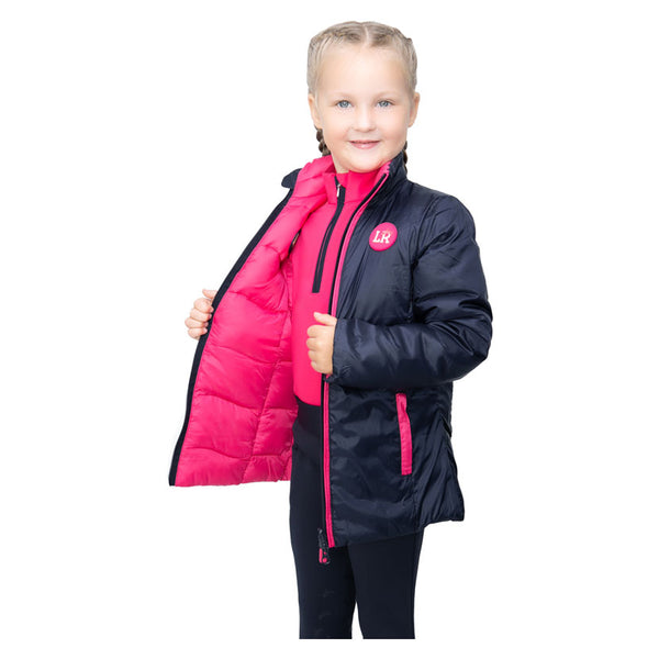 Child wearing Analise Reversible Padded Gilet by Little Rider showing reversible lining